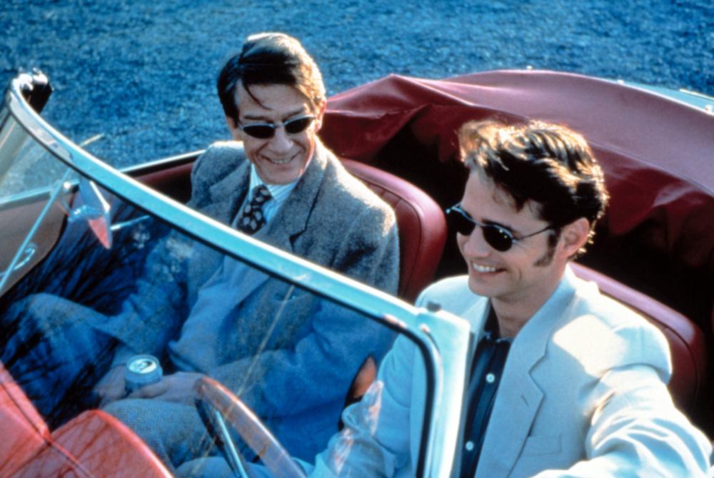 John Hurt and Jason Priestley in Love and Death in Long Island